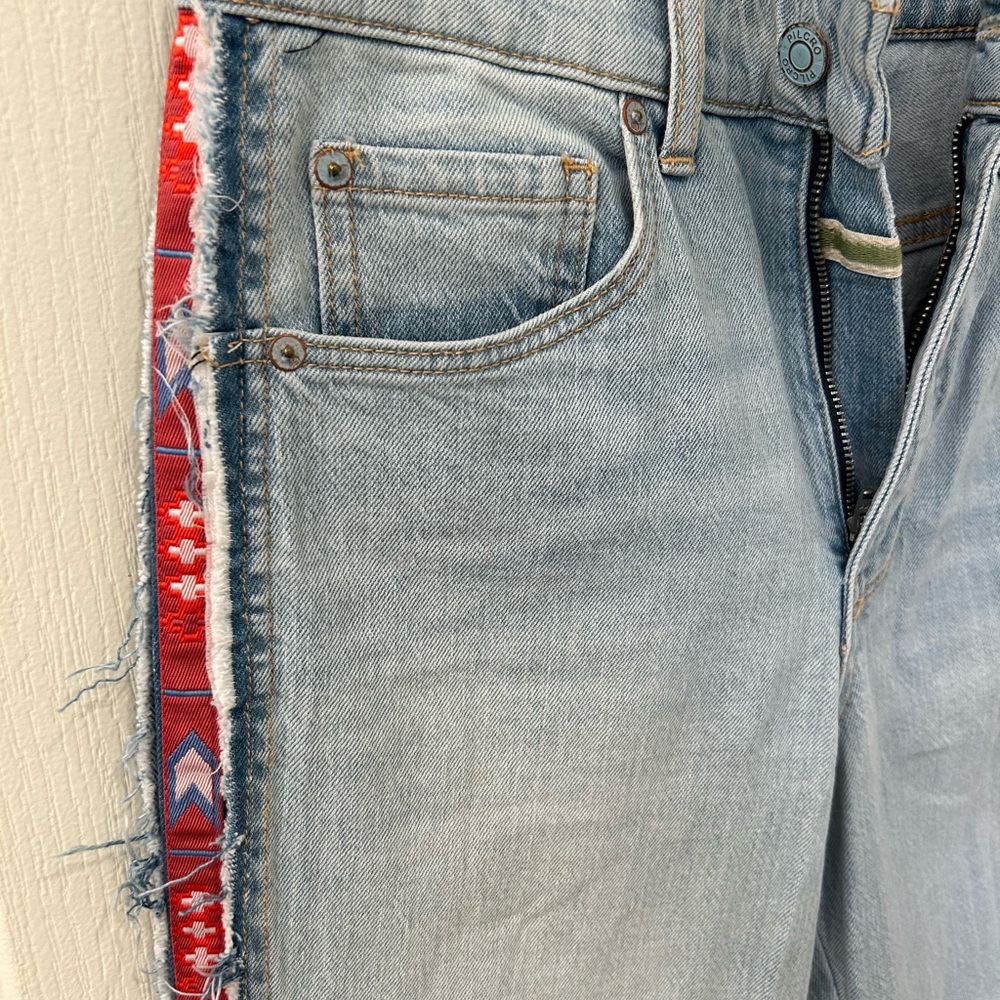 Light Blue Jeans with Red Patterned Trim